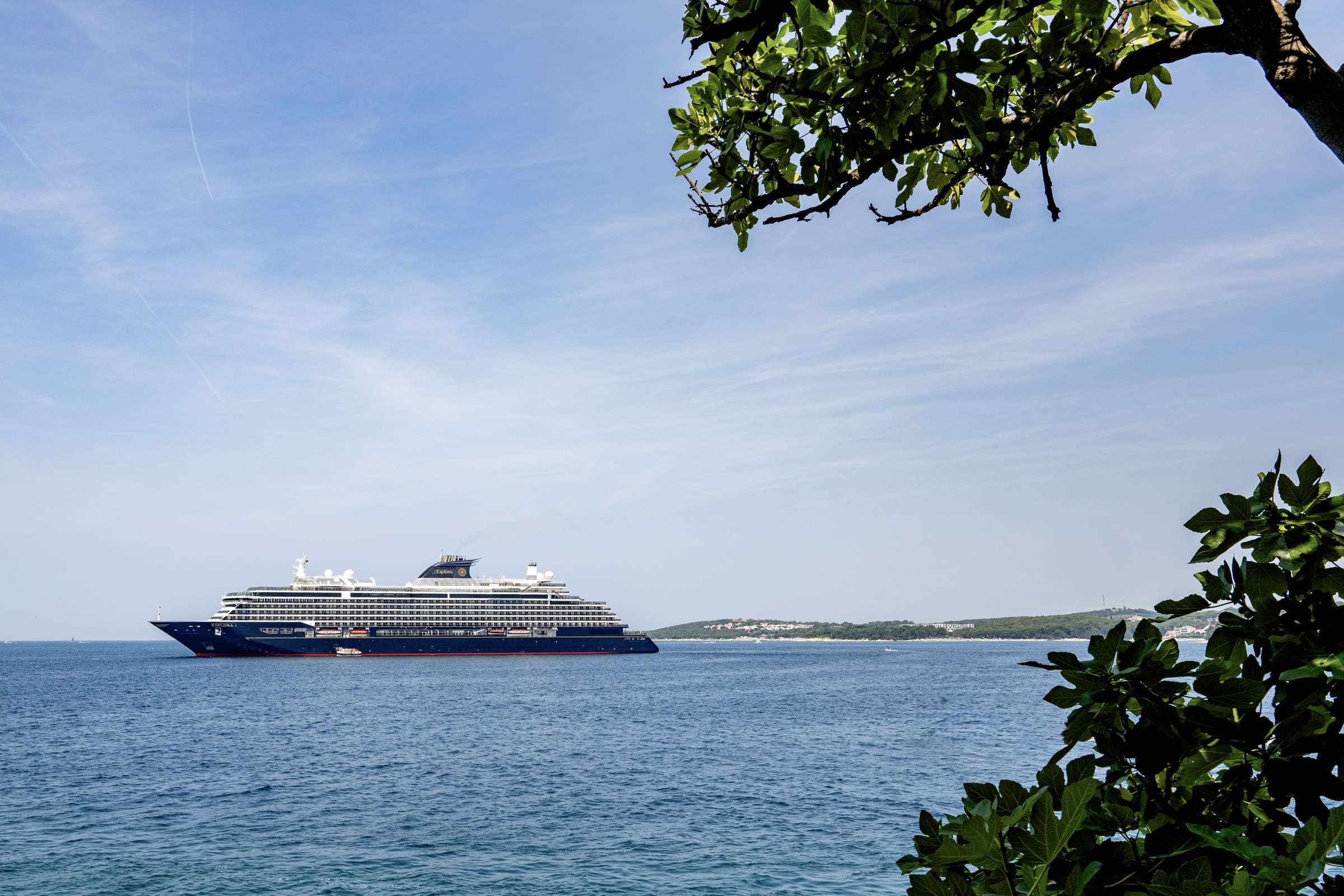 Explora Journeys luxury ship sailing along a Croatian coastline
